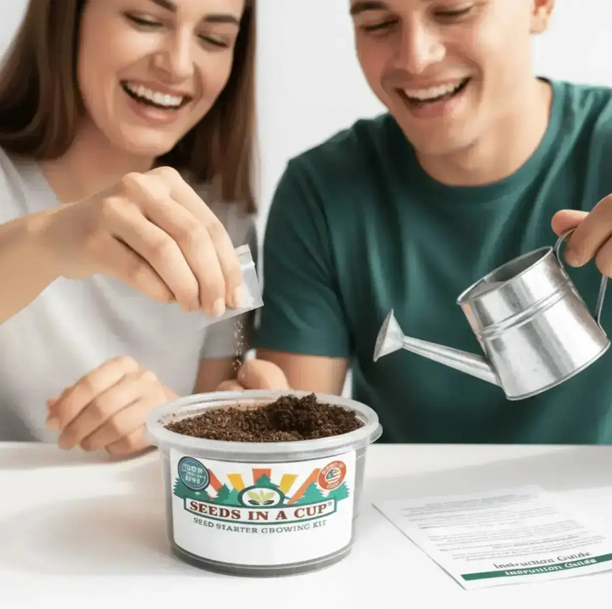 Two people planting seeds in the top rated brand 'Seeds in a Cup' kit with a smile and enjoying learning about seed growth