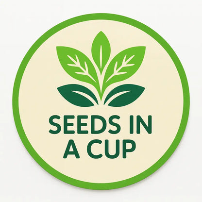 Healthy Collard Greens (Brassica oleracea var. viridis) seedling growing in a Seeds In A Cup recyclable planter. Demonstrates successful germination using real potting soil and non-GMO seeds.