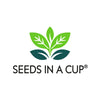 Logo of 'Seeds in a Cup' with green leaves on a white background